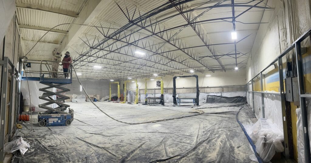 Image of a spray foam insulation project in a commercial setting. Opting for Hill Country Spray Foam Insulation in San Antonio, TX signifies embarking on a journey with a partner that cherishes your comfort and cost-efficiency as much as you. Harnessing our deep-seated industry experience, fostering a familial approach, and pledging an unwavering commitment to excellent service, we devise insulation solutions meticulously crafted for your individual needs. Led by Axel Cerda, our team ensures more than superior-quality insulation; we guarantee a pleasant, professional, and fulfilling customer journey. Entrust us with your home or business, confident that we will care for it as we would our own - after all, to us, you're not just a customer, you're part of our family.
